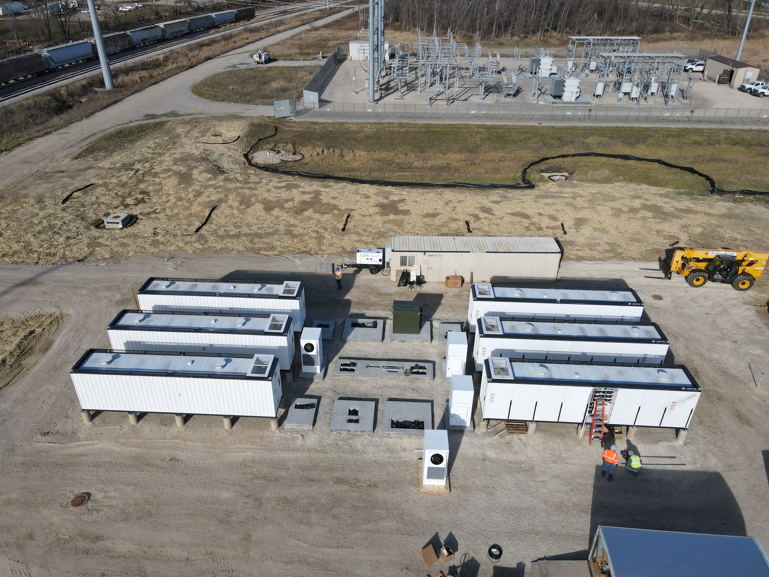 Aerial view of a large solar BESS site with equipment.