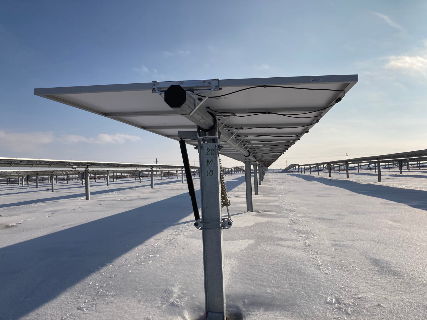 Solar panel on a metal stand with a clear sky background